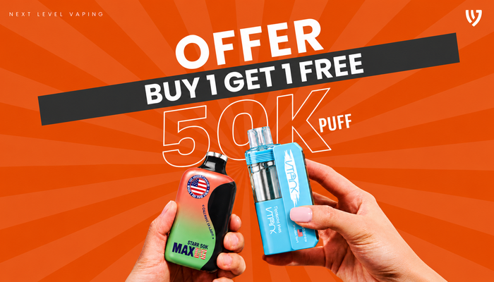 Promotional graphic for Next Level Vaping showing two hands holding two vape devices against an orange sunburst background. Large text reads 'OFFER BUY 1 GET 1 FREE 50K PUFF'.